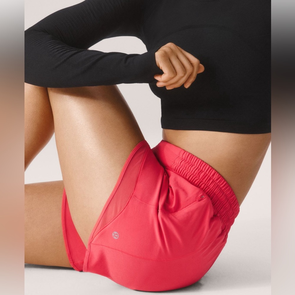 Lululemon, Size 10, Pink, Hotty Hot Low Rise Lined Short, 2.5 “. Mesh, pockets.